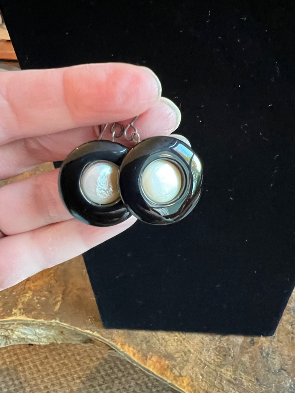 Black Round Drop Earrings with Rotating Pearl Centers